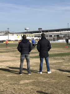 Earnie Stewart and Chris Albright take in Union open training