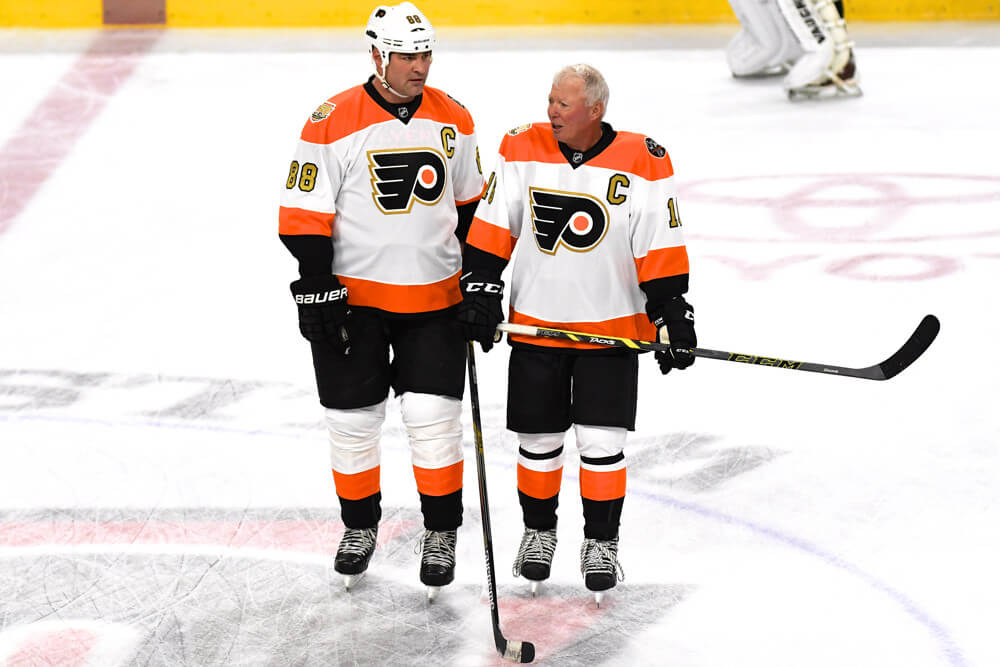 Flyers' Eric Lindros and Bobby Clarke