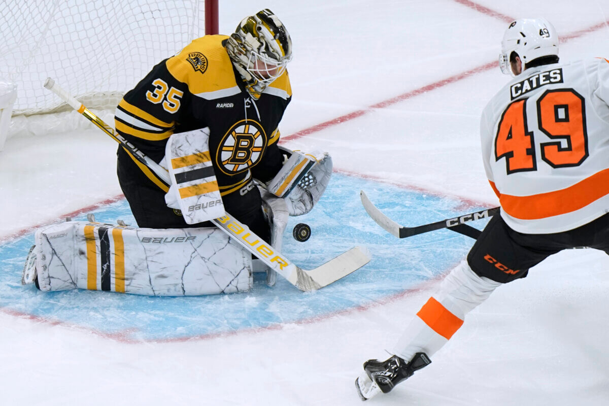Flyers' Noah Cates shoots on Bruins' Linus Ullmark