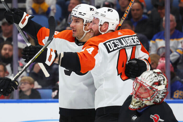 Flyers' Garnet Hathaway and Nicolas Deslauriers celebrate.