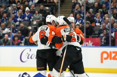 Flyers' Travis Sanheim celebrates