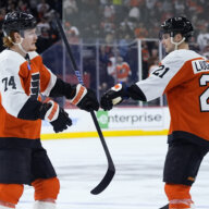 Flyers' Tippett and Laughton celebrate.