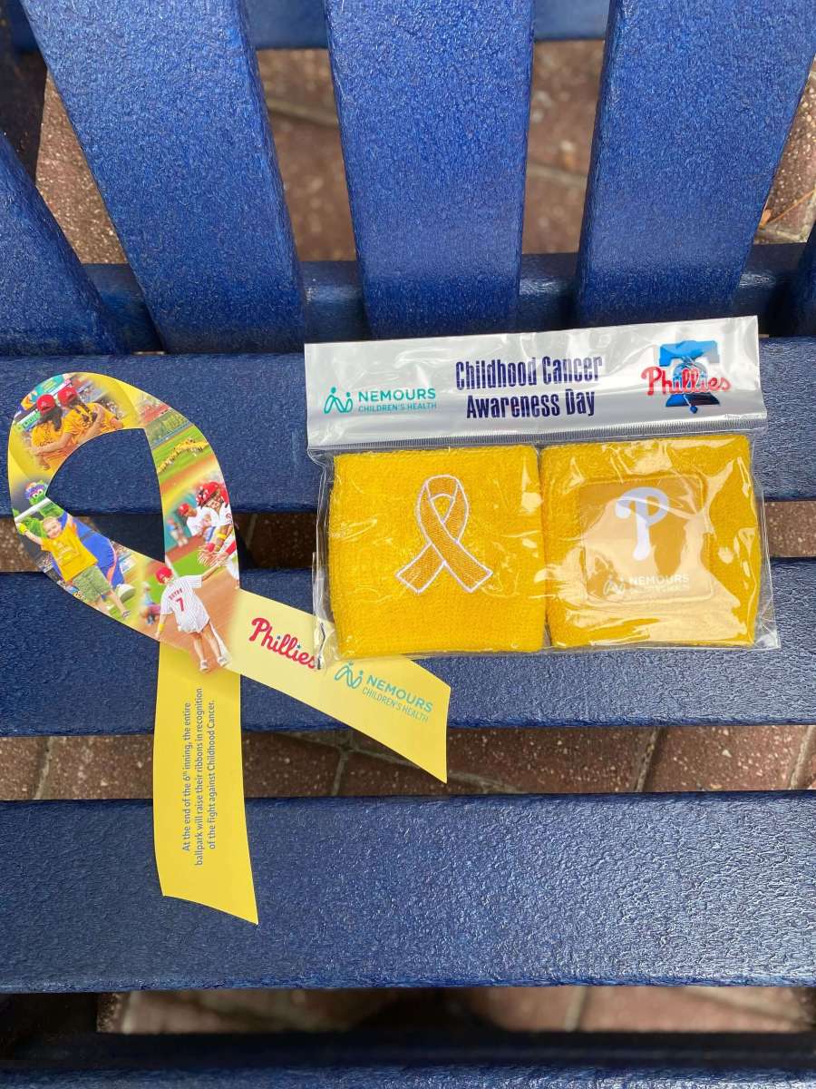 The Phillies gave away wrist bands and a ribbon in honor of Childhood Cancer Awareness Day. Photograph taken by Kyle Fisher.